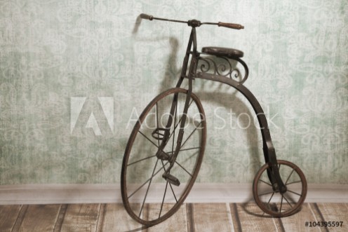 Picture of Historical bicycle by the wall